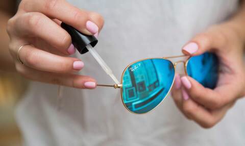 Tighten your sunglasses with a dab of clear nail polish. paint a small bit of polish over the hinge to temporarily tighten it.