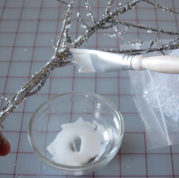 To create an icy look – spread some white glue in a few places along the  branch