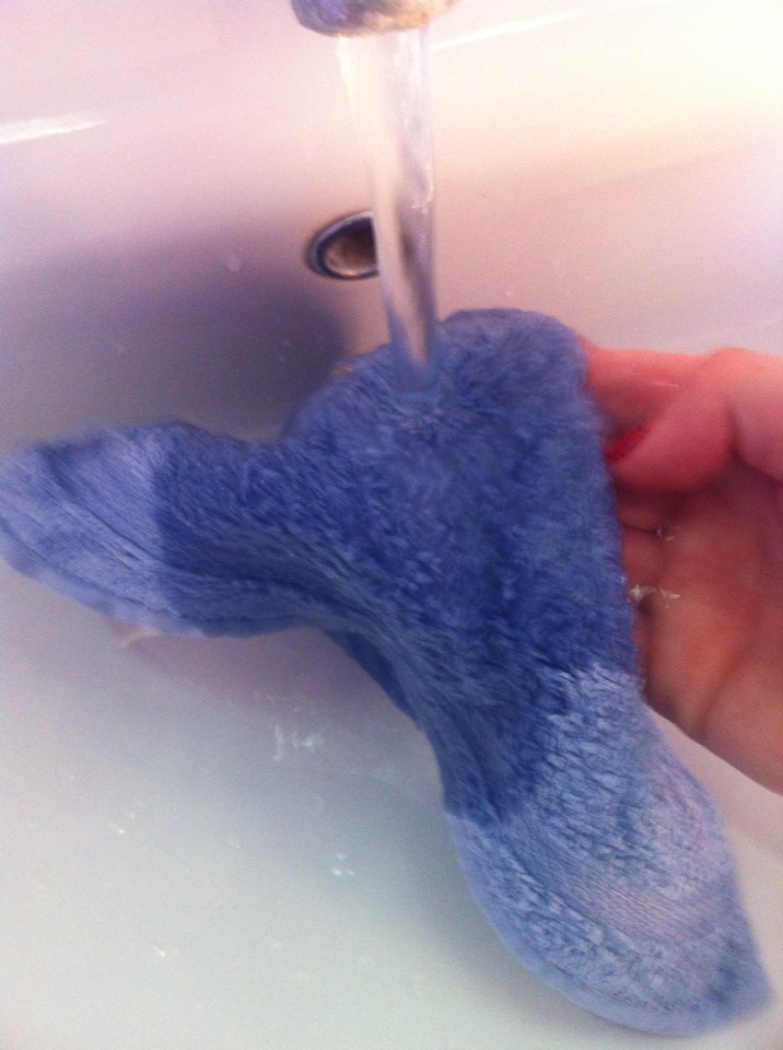 Get a rough flannel and soak it using warm water