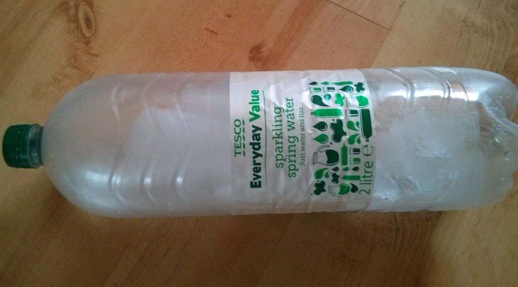 Put the water bottle in the freezer and freeze the bottle. Then once it's frozen fill up the rest with water so one half is water and one half is water. WOO NOW U HAVE COLD WATER!