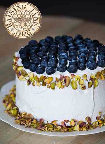 Garnish with remaining ½ cup shelled and chopped pistachios and ½ cup blueberries. Chill for 2 hours before serving.