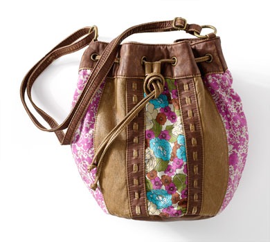 A purse! Pick one out at Claire's for only 10- 20 bucks! They'll make your daughter feel a bit more mature with a purse, yet with a youthful look!