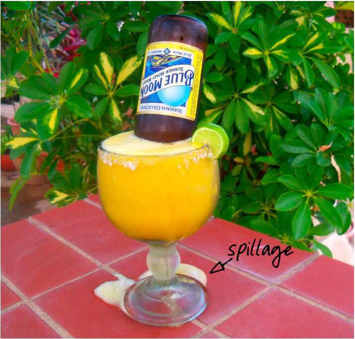 This part is IMPORTANT, no matter what kind of glass your using, only fill it half way with the mango margarita, i poured too much margarita & when i inserted the beer, i got major spillage