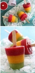 Click on photo
Equally fill four small 5 oz cups with the kiwi puree and place in the freezer; freeze one hour.
Add mango puree and freeze 20 minutes. Insert sticks and freeze at least 2 hours. Add raspberry puree and freeze overnight.