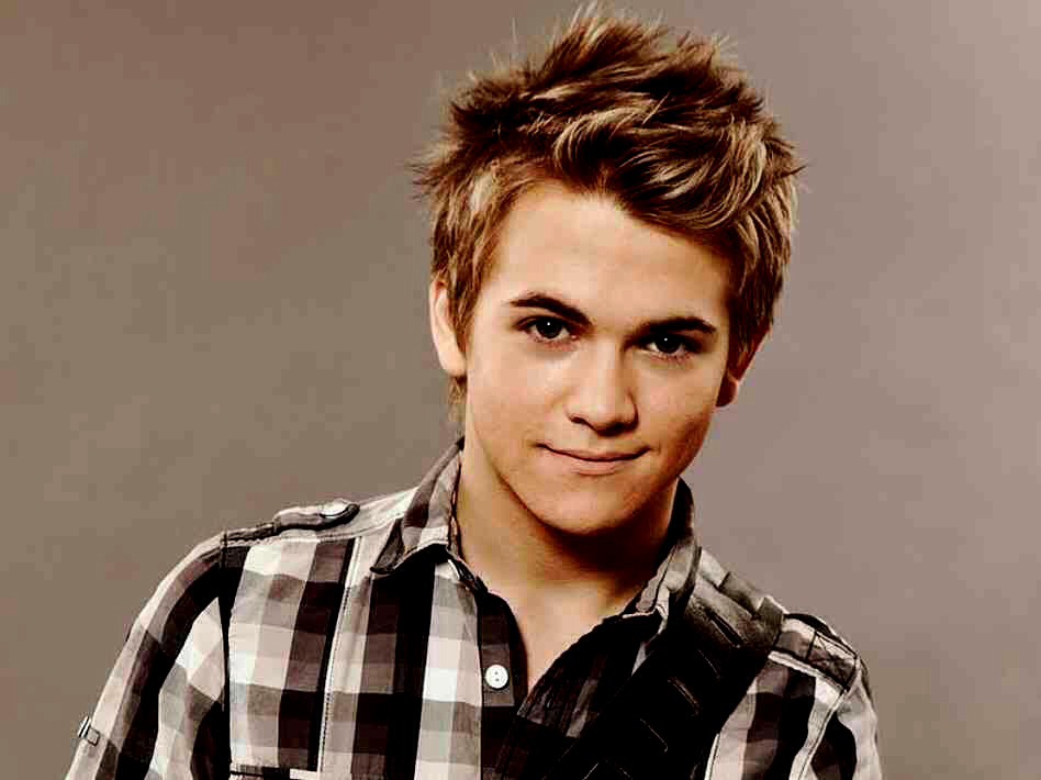 I believe this hot guy is one of the youngest country singers -- Hunter Hayes 