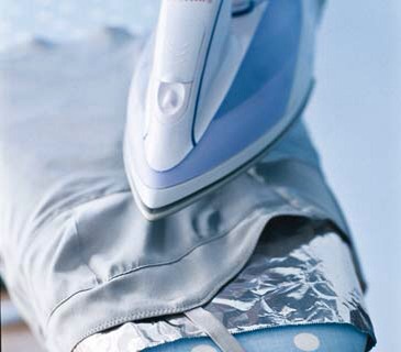 Aluminum Foil as Wrinkle Remover. With the steam button down, pass the iron three to four inches over the fabric several times. Wet heat radiating from the foil helps smooth out wrinkles.