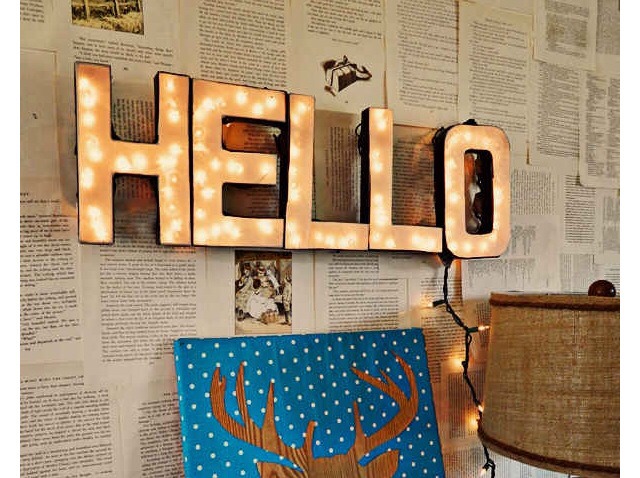 Instead of just randomly hanging up fairy lights make a design to put them in. Maybe a heart box. Or a word like this one. 