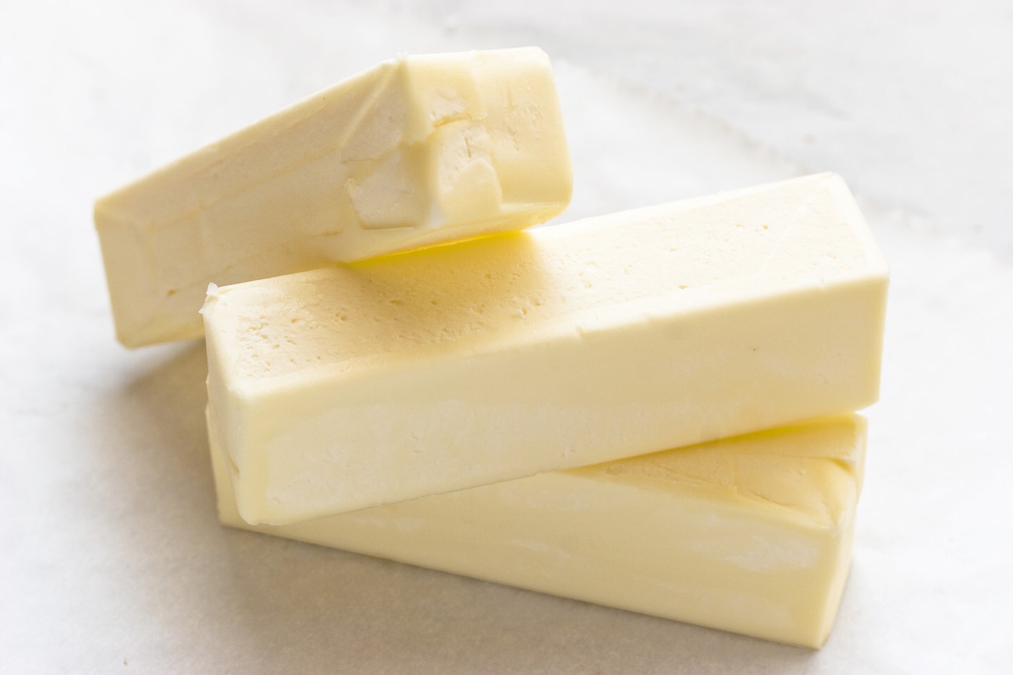 Add 1 C. (2 sticks) of softened butter in the mixer and beat for about 3 minutes until it's lightened in color and fluffy. 