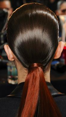 2. If You Want: Straight Strands
For long straight, sleek hair come morning, Edward Tricomi of Warren-Tricomi Salons suggests blowing out your hair the night before—but don't flatiron it. Then, gather hair into a ponytail. 