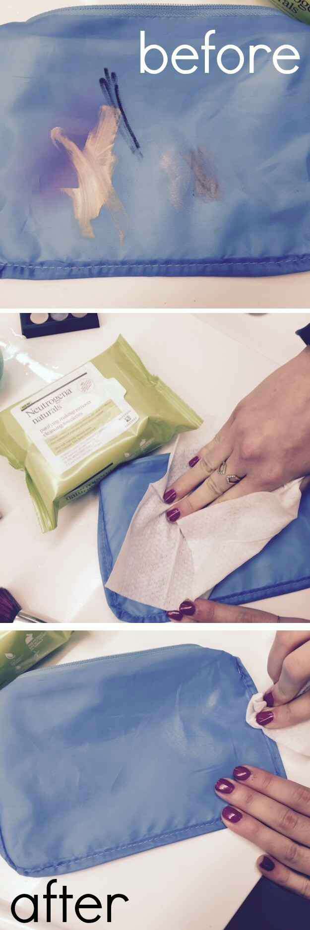 1. Empty out your makeup bag, flip it inside out, and use makeup remover wipes to clean the inside.
Or, if you have a cloth makeup bag, empty and flip it inside out, then stick it in the washing machine with your dark clothing.
