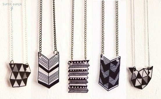 Geometric Shrinky-Dink Necklace

Full instructions here:
http://hocuskocis.blogspot.com/2012/07/diy-shrinky-dink-necklace.html