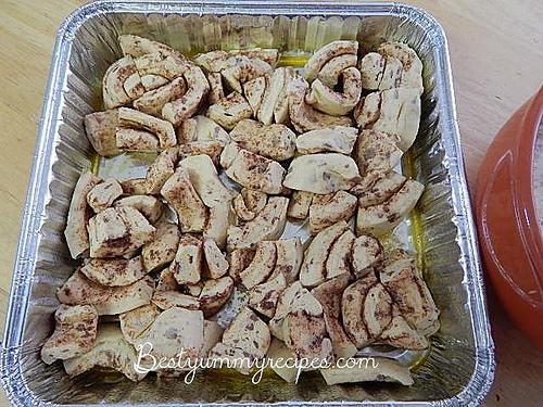 Directions

Melt butter and pour on ungreased 13×9 inch glass dish. Separate cans of dough into 16 rolls reserving the icing for later use.  Cut each roll into 8 pieces and add to buttered baking dish.