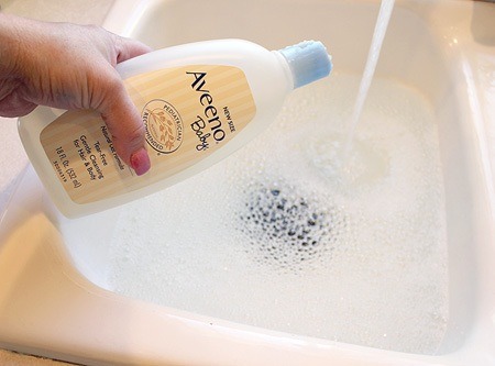 Fill a sink with lukewarm water and add a capful of baby shampoo into the water. (Many tutorials I read said to use CONDITIONER…but this made more sense to me…so this is what I used.)