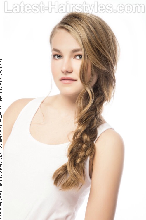 Dusk

This gorgeous boho-inspired hairstyle features a loose braid secured without an elastic, giving it a more organic look.