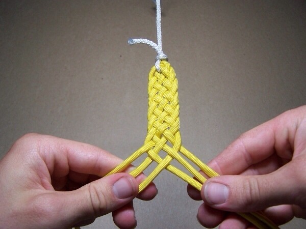 Braided Cord Bracelet

Full instructions here: (You can swatch 'paracord weaves' on YouTube.com for more complex designs)
http://www.seekyee.com/Slings/howtos/6strand1.htm