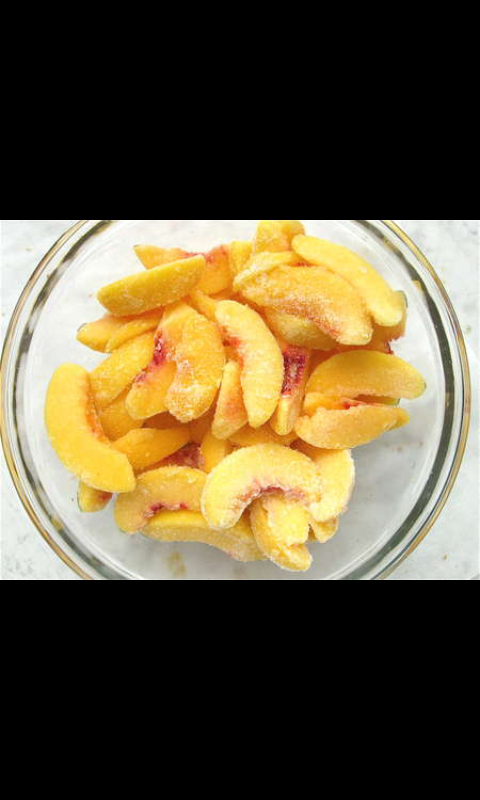 Last, put frozen sliced peaches. 