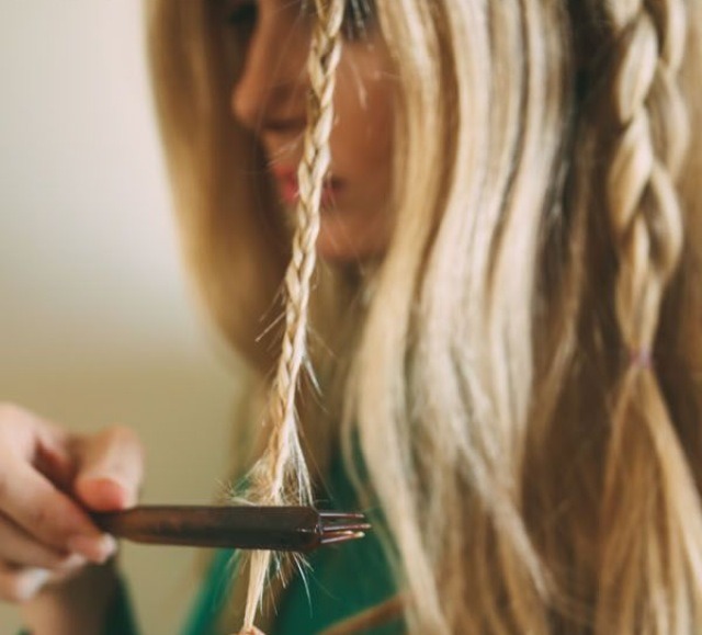 Tease the end of the small plait to secure it.