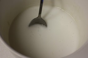 2) Slowly add water until you've made a thick paste.  Add just a little water a time.  You'll want the mix to feel like putty.