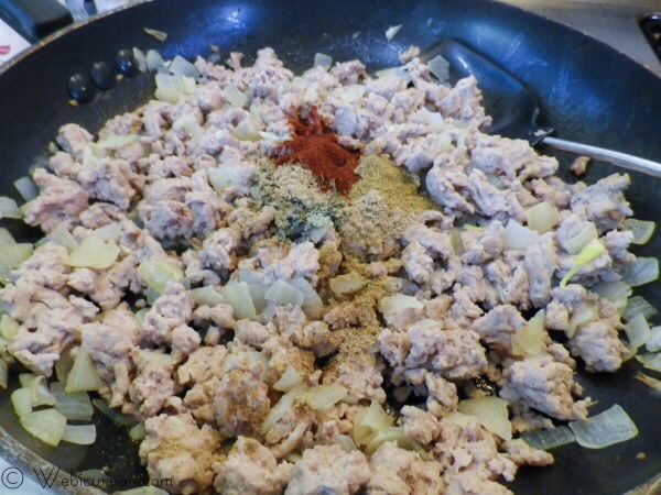 Add in the ground turkey, breaking it up as it browns. Once the turkey is cooked, stir in the spices, the salsa, rice and quinoa, and heat through.