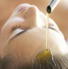 Apply the oil to your entire scalp and massage it in.