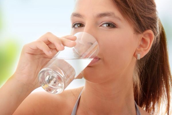 You aren't drinking enough water! Water helps rejuvenate and repair the skin. It will give you a nice glow and help get rid of any imperfections. So, pour yourself a nice glass of water and drink up! 