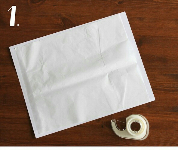 Step 1: Cut out a piece of white tissue paper slightly smaller than a sheet of printer paper, then tape the tissue shiny side down to the paper.