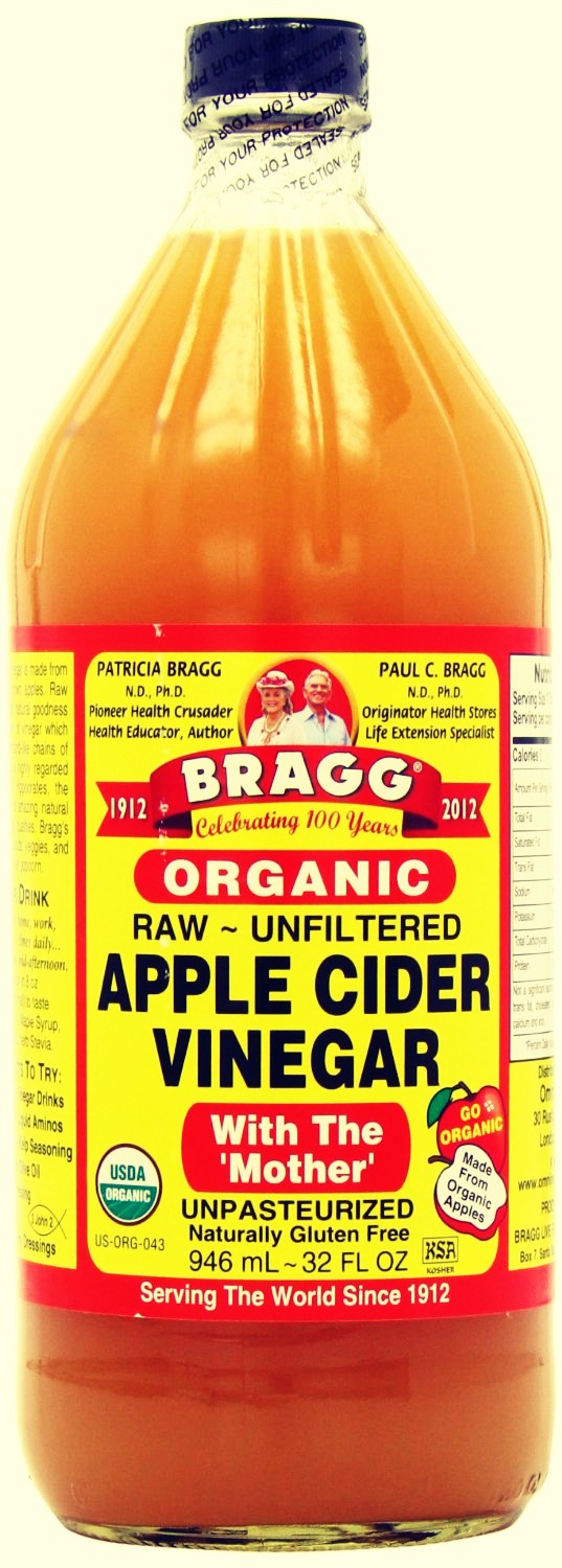 In the same bowl, add two tablespoons of Apple Cider Vinegar and then stir the mixture until the honey is dissolved 