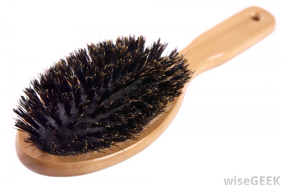 For even healthier hair use a boar bristle brush. It distributes oil throughout your hair and allows you to go longer without washing it. 