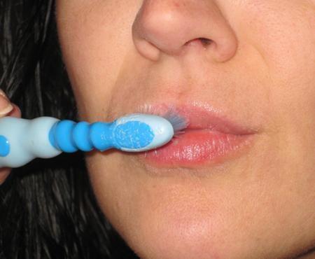 7. Lipstick Ready
Use a baby toothbrush to exfoliate your lips. To really get the job done, you can make a homemade lip exfoliate with sugar and coconut oil, or easier but not as effective, cover your lips in lip balm or petroleum jelly before scrubbing.