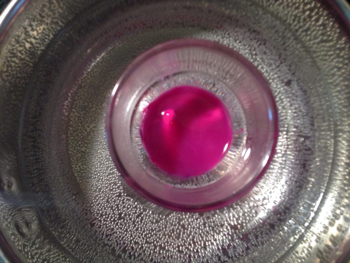 Once the coconut oil has completely melted add one piece of your crayon. Use one teaspoon for each piece of crayon, depending on how much you want. You can also mix colours...
