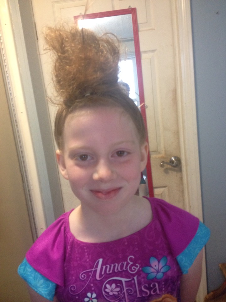 Front view. 
Face of " I am going to win craziest hair today" and she did :D 