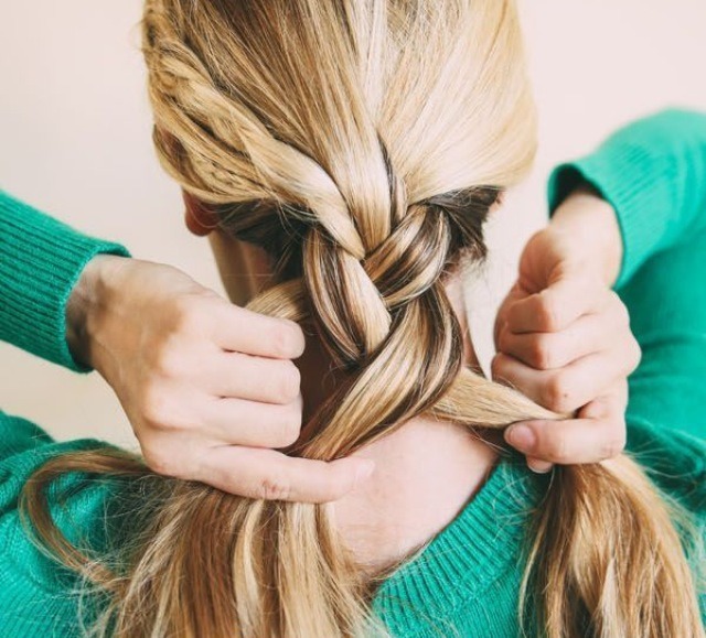 Braid all of the hair into a plait (not too tight) and secure at the end.