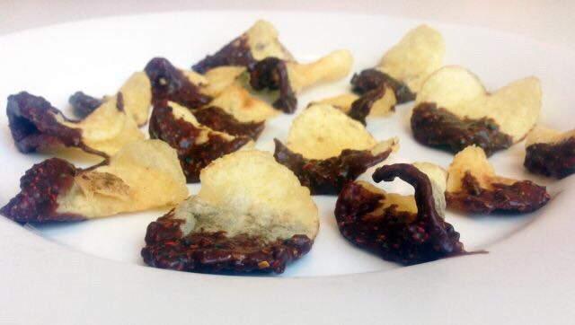 To make these yummy little snacks crush the m&ms and microwave until melted.
Splash some milk into the melted chocolate and stir until evenly distributed.
Then, simply place the chip into the chocolate and let it rest for 5 minutes or until chocolate hardens before consuming.
Enjoy!