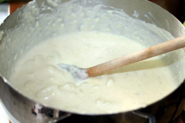 Let the potatoes boil until tender, maybe 15 minutes or so.  Then you want to start breaking up the potatoes by mashing them onto the sides of your bowl until the soup is thickened.  Don’t worry about smashing all of them, it gives it better texture to have both.
