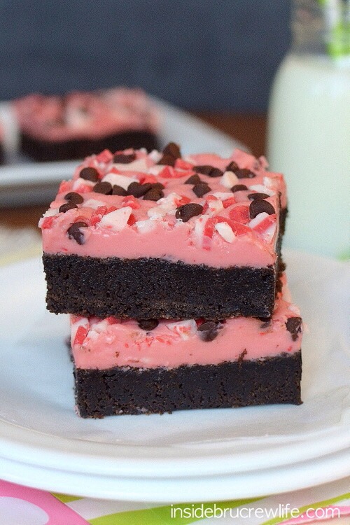 In a small saucepan, bring the coffee creamer to a boil. Remove from the heat and add 1/2 cup peppermint crunch pieces and white chocolate chips. Let this sit for 1-2 minutes. Stir until creamy. Spread over the top of the cooled brownies. 