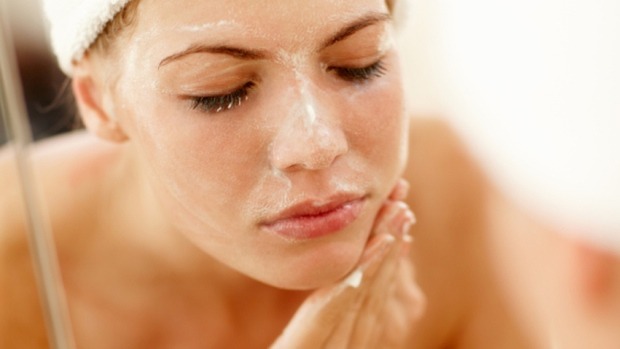 5) When the mixture has completely dried on your face, gently scrub it off using warm water, tackling all areas of your face in a circular motion.