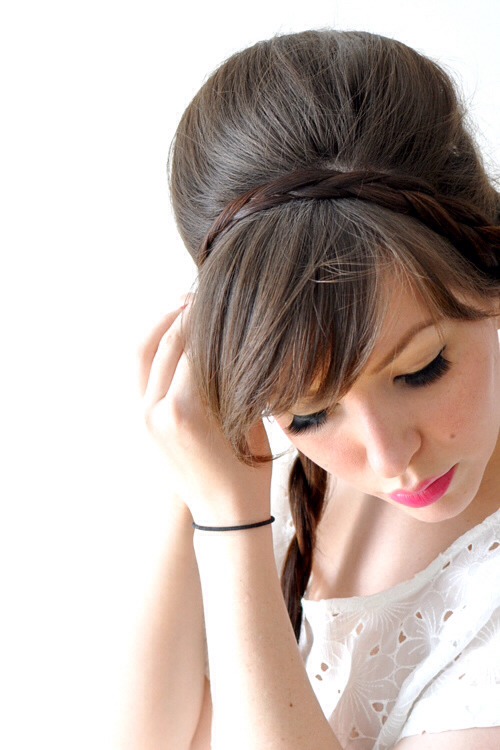 Pull each braid to the opposite side of your head and pin in place. Tuck the ends of the braid underneath 