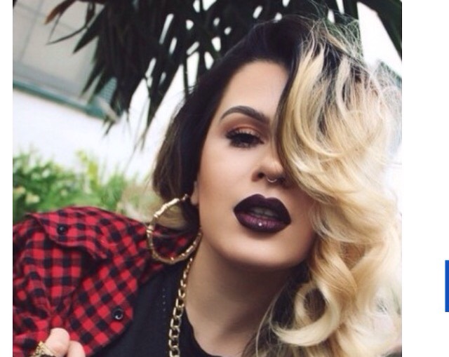 8. Neutral beige eyeshadow, bold brows, dark vamp lip. 