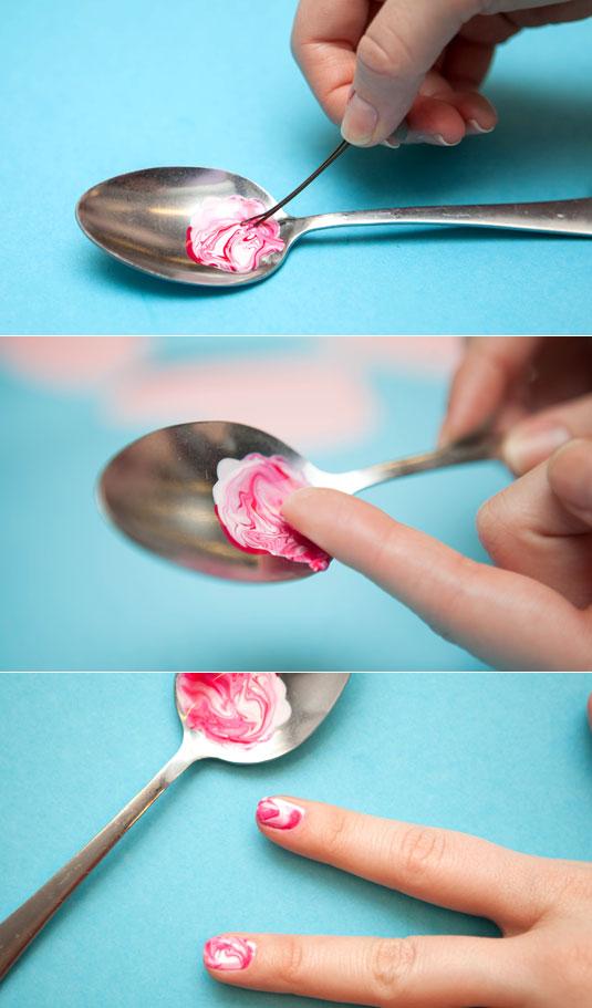 10. Give your nails a marble effect by swirling two polishes together and rolling your nail over the edge of the spoon.