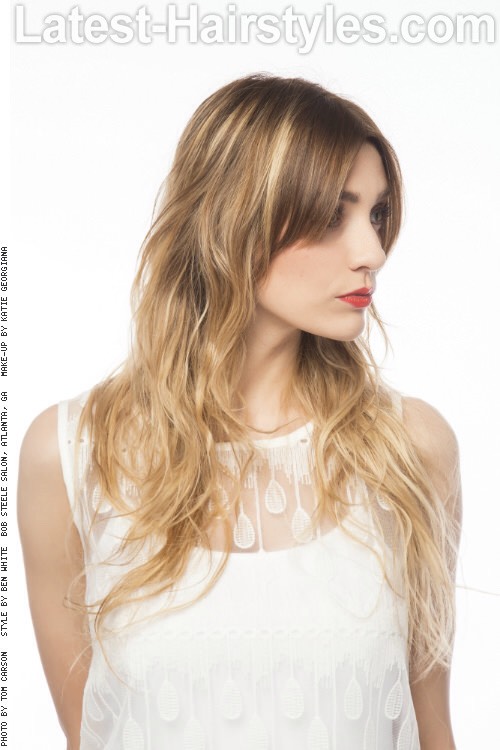 How To Style:

Apply a volumizing mousse to wet hair.
Section the hair into three large sections.
Braid each section and secure with an elastic band.
Air dry or wear the braids to bed.
Once the hair is completely dry, remove the elastics.
Scrunch the hair with a texture product.