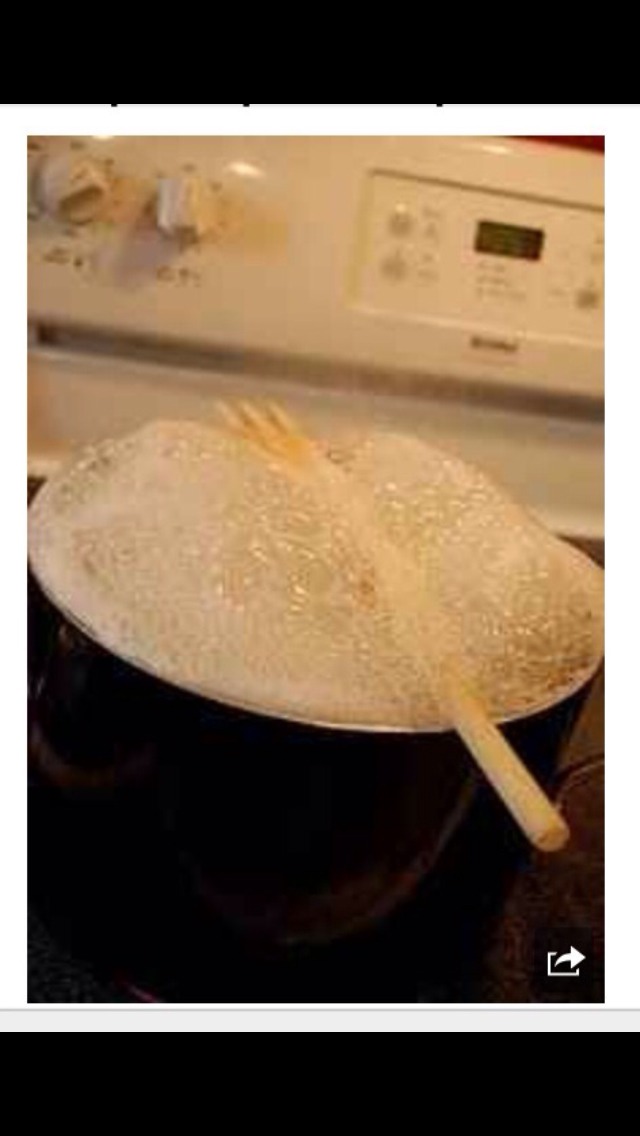 A wooden spoon will make it so that water doesn't boil over