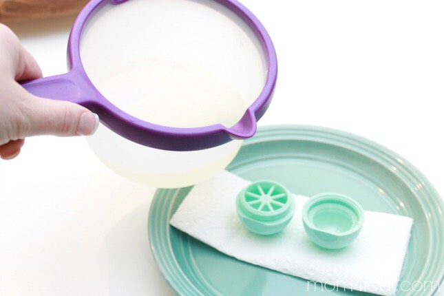 Pour your mixture into the cap part (for the round top to mold the Chapstick) and set it carefully in the freezer for 1 hour.