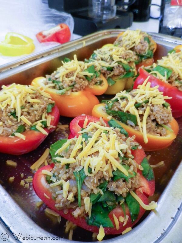 Pack the turkey mixture into the pepper halves so that they’re bulging. About a cup of filling. Then sprinkle the cheese over the top.