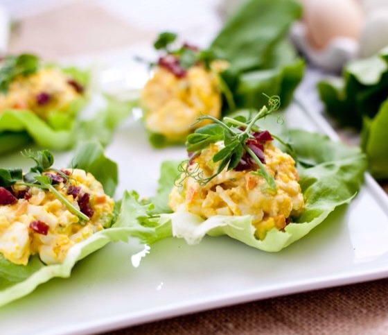 Egg Salad Lettuce Wraps

Egg salad becomes irresistible topped with salami and pea shoots- all wrapped in fresh butter lettuce!
