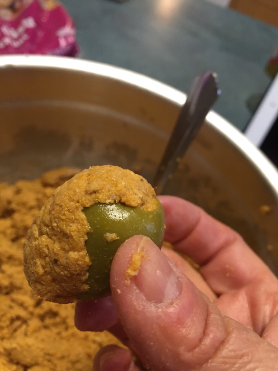 Stuff slit olives

Put enough meat in the olives to stuff but not break the olives apart.  

Make sure to pile some stuffing on the outside of the olive as well