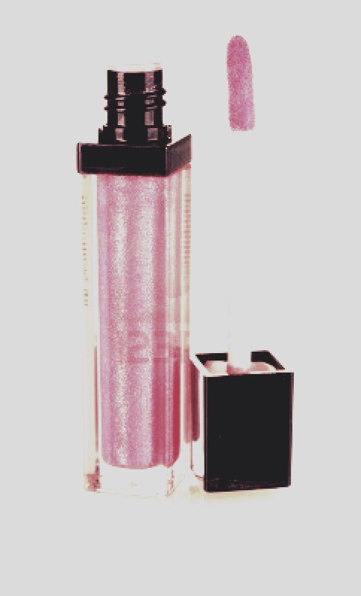 Get a dewy glow by blotting your favorite soft pink gloss over your eyelids and cheek bones