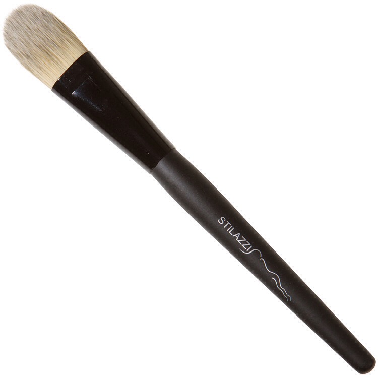 Next, put some of the foundation onto either your hand or a palette of some sort. Taking a foundation brush, which is usually thicker, dab the foundation onto the apple of your cheeks. Spread the foundation along the jaw from the apple towards the chin. 
