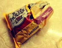 Pull the excess bag over the sides of the bottle