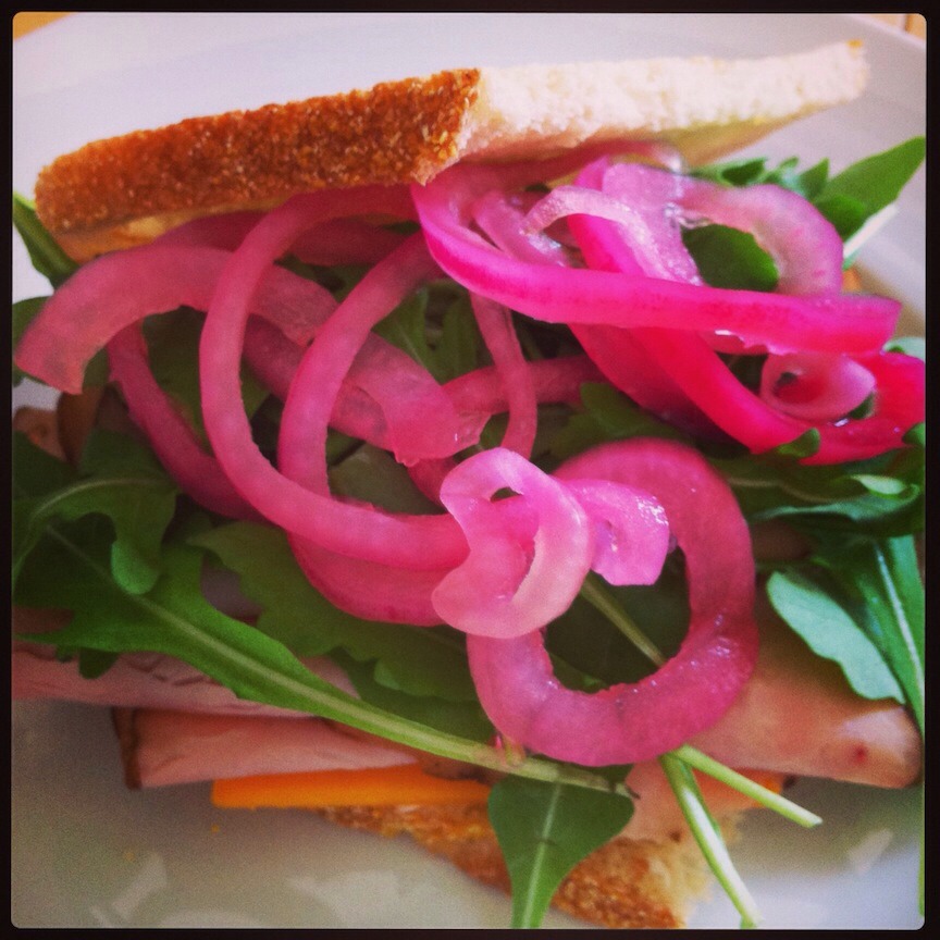 Slice some red onion very thinly and throw it in the pickle juice for perfect pickled onions! The “pickled” onions liven up turkey, chicken or ham sandwiches, as well as hamburgers.

-Add cilantro and use the pickled carrots & onions as a topper for fajitas or tacos.