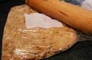 Crush the Biscuits with the end of a rolling pin or use your hands and add to the melted mixture.

Pour the mixture into a swiss roll size tin and press down.

Melt the chocolate and pour over the mixture. Spread it out evenly.

Put into fridge and leave to set for an hour.

Cut into about 20 pieces